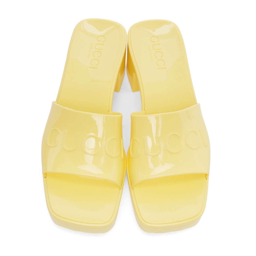 Yellow Gucci rubber slide sandals